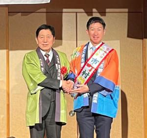 豊後大野市から津久見市へたすきリレー